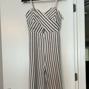 See you Monday black/white sleeveless jumpsuit